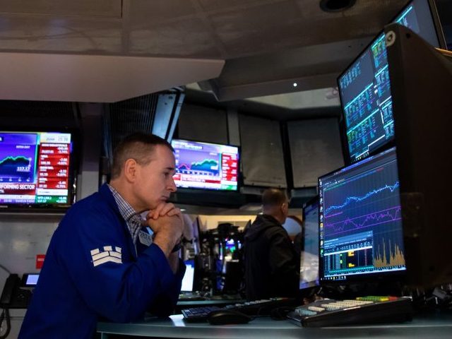 A trader works on the floor of the New York Stock Exchange NYSE in New York, the United St