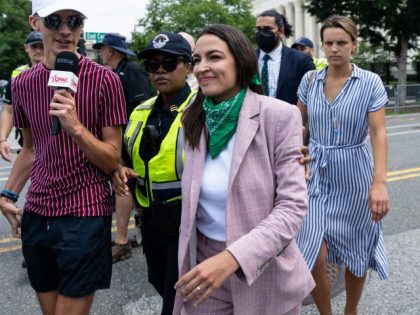 Rep. Alexandria Ocasio-Cortez (D-NY) walks back to the Capitol after speaking in front of the Supreme Court following the Dobbs v Jackson Women’s Health Organization decision overturning Roe v Wade was handed down at the U.S. Supreme Court on Friday, June 24, 2022. (Bill Clark/CQ-Roll Call, Inc via Getty Images)