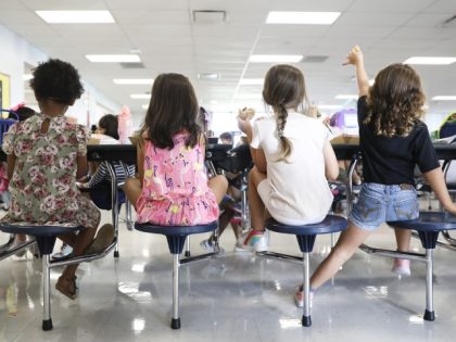 APOLLO BEACH, FL - OCTOBER 4: Students eat their lunch in the cafeteria at Doby Elementary School in Apollo Beach, Florida on October 4, 2019. In Hillsborough County, students pay $2.25 for lunch. (Eve Edelheit for The Washington Post via Getty Images)