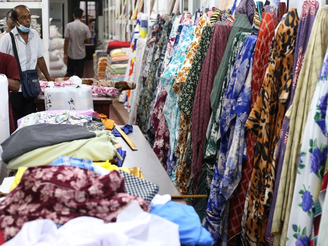 Fabrics are displayed at Pettah Market in Colombo, Sri Lanka, on May 24, 2022. Dr. Nandalal Weerasinghe expects Sri Lanka to face more challenges during the debt restructuring period, he said during a press conference held on Monday (23). (Pradeep Dambarage/NurPhoto via Getty Images)