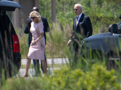 President Joe Biden and first lady Jill Biden walk from Marine One upon arrival in Rehobot