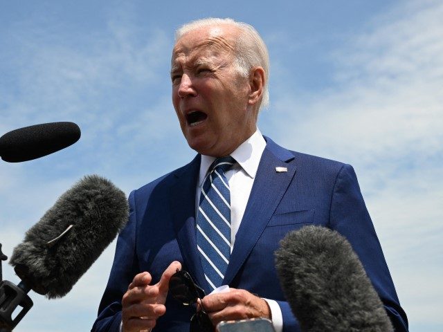 President Joe Biden speaks with the press before boarding Air Force One at Joint Base Andr