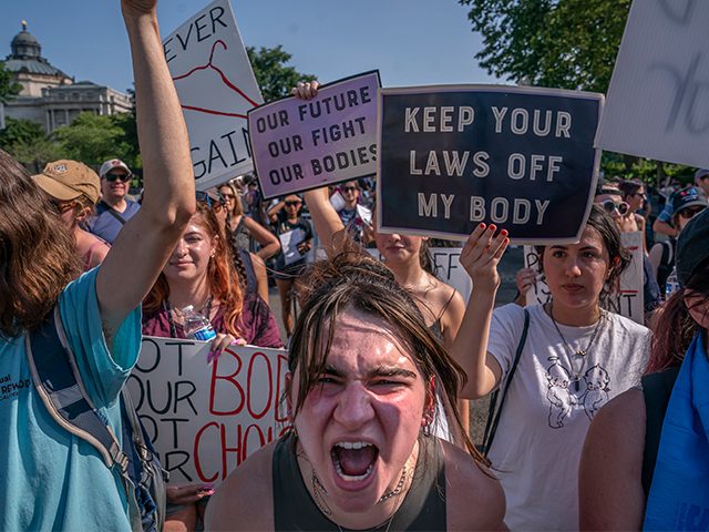 Pro-abortion activists protest in front of the Supreme Court on June 26, 2022, in Washingt
