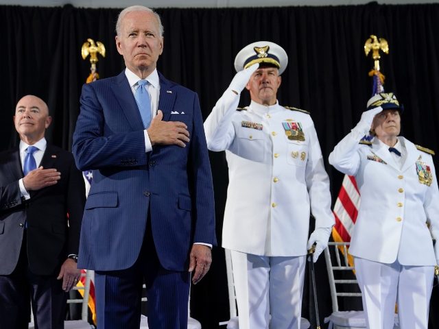 President Joe Biden participates in a change of command ceremony at U.S. Coast Guard headq