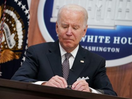 US President Joe Biden addresses the Major Economies Forum on Energy and Climate from the South Court Auditorium of the Eisenhower Executive Office Building, next to the White House, in Washington, DC on June 17, 2022. - Biden hosts the virtual summit of major economies, attempting to tackle climate change …