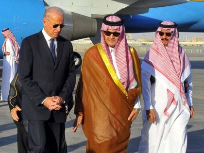 Saudi Foreign Minister Prince Saud al-Faisal (2nd R) welcomes US Vice President Joe Biden (C) at the Riyadh airbase on October 27, 2011, upon his arrival in the Saudi capital with a US official delegation to offer condolences to the King Abdullah bin Abdul Aziz following the death of his …