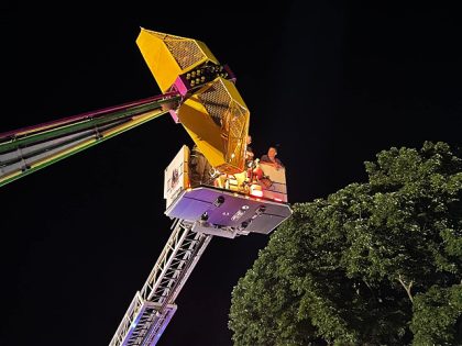 Seven people were rescued by Kirkland, Missouri, firefighters Friday night after they became stranded on a carnival ride that left some suspended 40 feet in the air.
