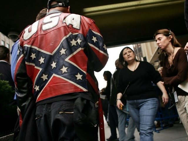 NEW YORK - NOVEMBER 15: A man wears a jacket with the confederate flag displayed on it in front of Madison Square Garden, host to this years Country Music Association awards November 15, 2005 in New York City. The awards, which 37 million people tuned into last year, have been …