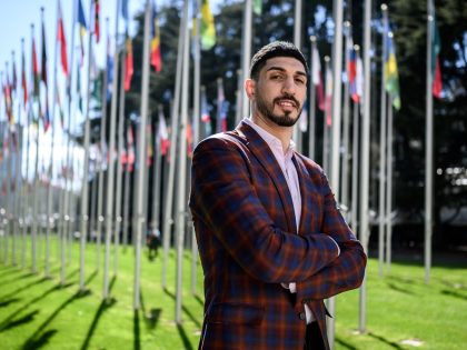 American basketball player Enes Kanter Freedom poses during an interview with AFP at the United Nations Office in Geneva on April 5, 2022. - Enes Kanter Freedom, whose human rights advocacy has ruffled feathers, hopes to bend UN human rights chief Michelle Bachelet's ear on Thursday about her forthcoming China …