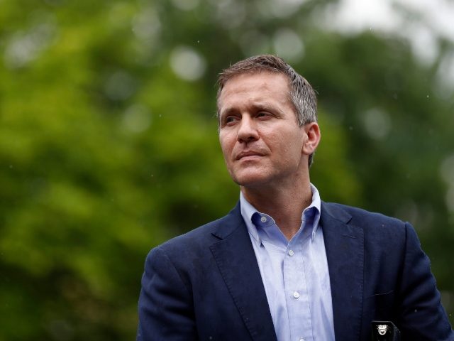 FILE- Then Missouri Gov. Eric Greitens waits to deliver remarks to a small group of supporters near the capitol in Jefferson City, Mo. in this May 17, 2018 file photo. A federal elections watchdog group on Wednesday, Nov. Dec. 1, 2021 filed another complaint against former Missouri Gov. Greitens, alleging …