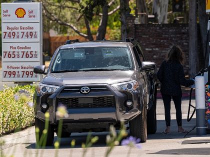 A customer fuels a vehicle at a Shell station in Menlo Park, California, US, on Thursday,