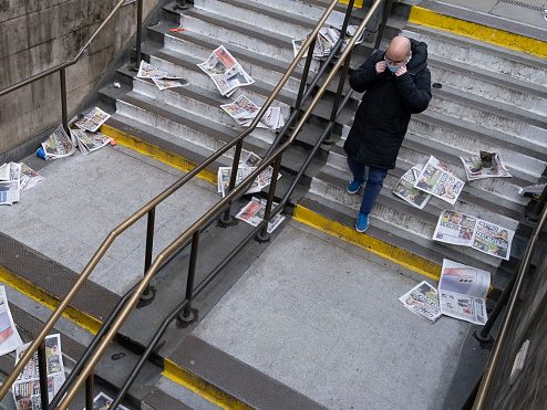 As Londoners are told to remain at home and therefore few commuters taking newspapers for their homeward journeys, copies of the Evening Standard blow down the steps of Bank Underground station during the third lockdown of the Coronavirus pandemic, in the 'City of London', the capital's financial district, aka The …