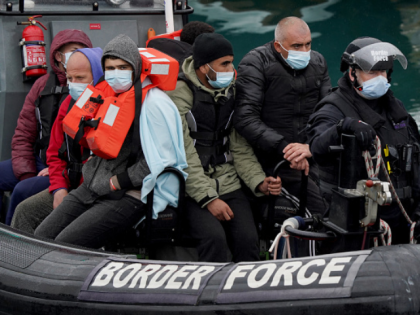 A group of people thought to be migrants are brought in to Dover, Kent, onboard a Border Force vessel, following a small boat incident in the Channel. Picture date: Monday May 23, 2022. (Photo by Gareth Fuller/PA Images via Getty Images)