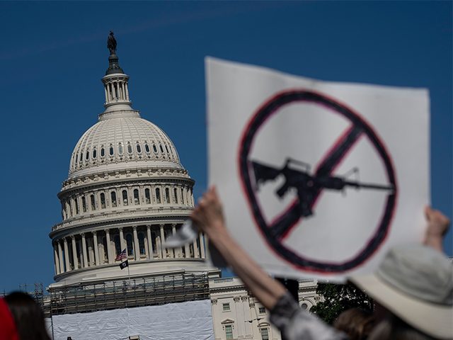 WASHINGTON, DC - JUNE 06: Jane Harman, of Tacoma, MD. holds a sign while attending a gun safety reform rally near the Capitol Reflecting Pool on Monday, June 6, 2022 in Washington, DC. (Kent Nishimura / Los Angeles Times via Getty Images)