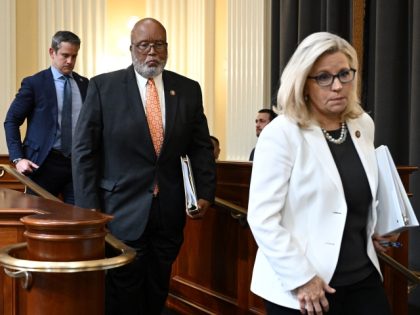 (From L) US Representative Adam Kinzinger, US Representative and Committee Chairman, Bennie Thompson, and US Republican Representative and Vice Chairwoman Liz Cheney make their way to greet witnesses following the fifth hearing by the House Select Committee to Investigate the January 6th Attack on the US Capitol in the Cannon …