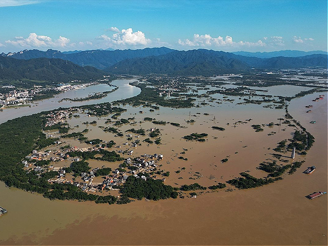 YINGDE, GUANGDONG PROVINCE, CHINA - JUNE 23: An aerial view of the flooding place as flooding grips in Yingde, Guangdong Province of China on June 23, 2022. After the water level of Beijiang river rose, Yingde City suffered serious flood disaster. (Photo by Stringer/Anadolu Agency via Getty Images)