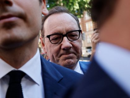 US actor Kevin Spacey reacts as he arrives at the Westminster Magistrates' Court, in London to attend the opening of his trial, on June 16, 2022 in order to face charges of four counts of sexual assault. - Kevin Spacey, 62 and two-time Oscar winner for "The Usual Suspects" and …