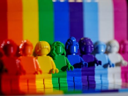This picture taken on June 3, 2021 shows Danish toy brick maker Lego's "Everyone is Awesome" new set of rainbow-coloured figurines to celebrate the diversity of its fans and the LGBTQI+ community. / AFP PHOTO / Thomas SAMSON - The new 346-piece set will went on sale on June 1 …
