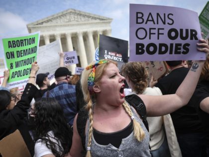 WASHINGTON, DC - MAY 03: Pro-choice and anti-abortion activists confront one another in front of the U.S. Supreme Court Building on May 03, 2022 in Washington, DC. In a leaked initial draft majority opinion obtained by Politico and authenticated by Chief Justice John Roberts, Supreme Court Justice Samuel Alito wrote …
