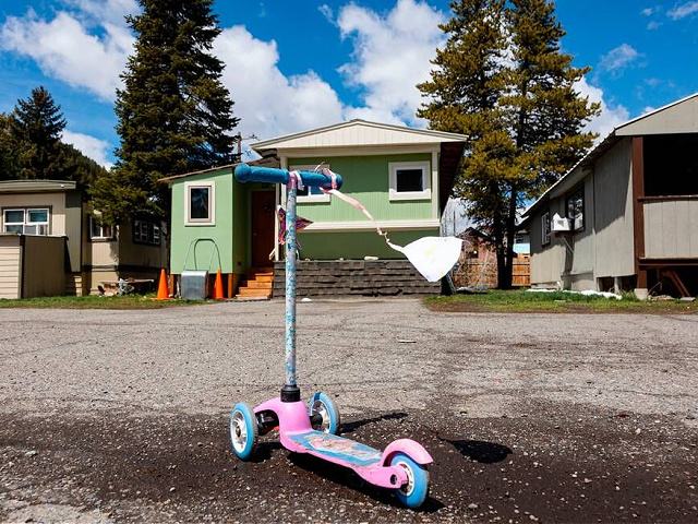 A childâs scooter is parked in the parking lot of J&J Trailer Park in Ketchum, Idaho, on Sunday, May 1, 2022, when residents had a rally to ask for more time to move. (Sarah A. Miller/Idaho Statesman/Tribune News Service via Getty Images)