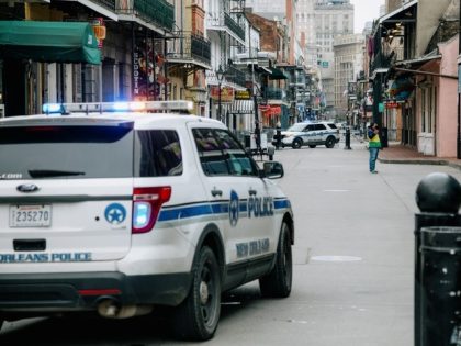 Police vehicles block access to Bourbon Street in New Orleans, Louisiana, U.S., on Tuesday, Feb. 16, 2021. Since 1857, Mardi Gras celebrations in New Orleans have been called off only 14 times, because of war, mob violence, or labor disputes. Not even the last great pandemic could quell the street …