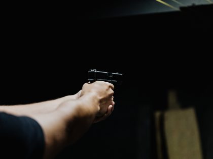 Person holding a handgun