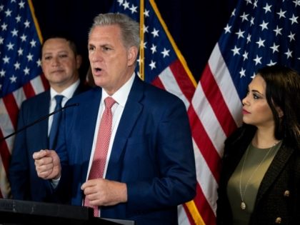 UNITED STATES - MAY 17: House Minority Leader Kevin McCarthy, R-Calif., flanked by Rep. Tony Gonzales, R-Texas, left, and Congressional candidate from Texas Mayra Flores, right, hold a news conference to announce the formation of the Hispanic Leadership Trust at the Republican National Committee headquarters in Washington on Tuesday, May …