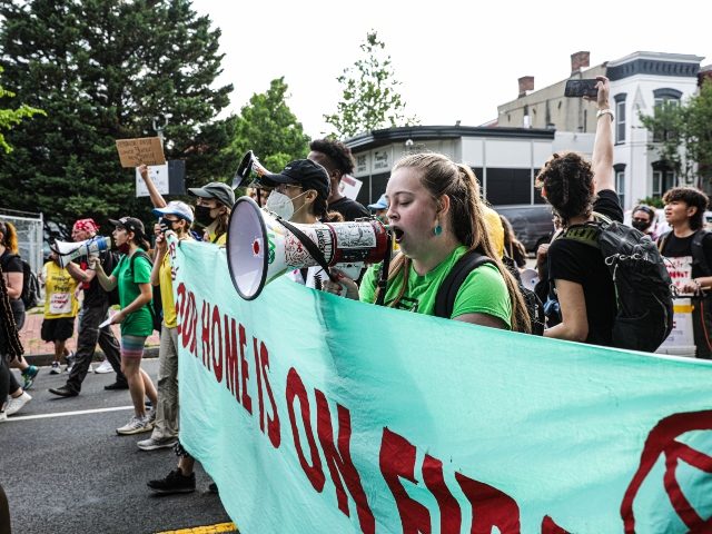 Protesters march during a ShutDownDC demonstration in Washington, D.C., US, on Monday, Jun