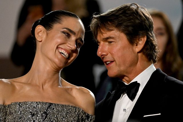 Actors Jennifer Connelly and Tom Cruise share a laugh after the screening of 'Top Gun: Mav