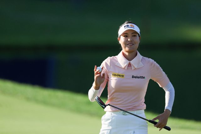 Chun In-gee smiles after a birdie on the last leaves her six shots clear at the halfway st