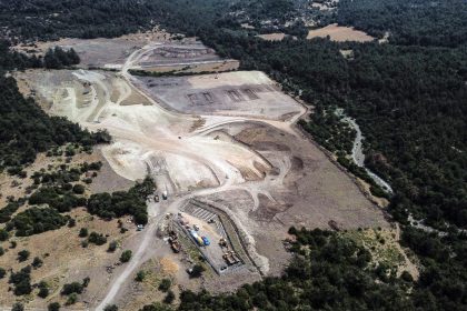 Greek critics say the camp -- on the edge of a dense pine forest in the middle of nowhere