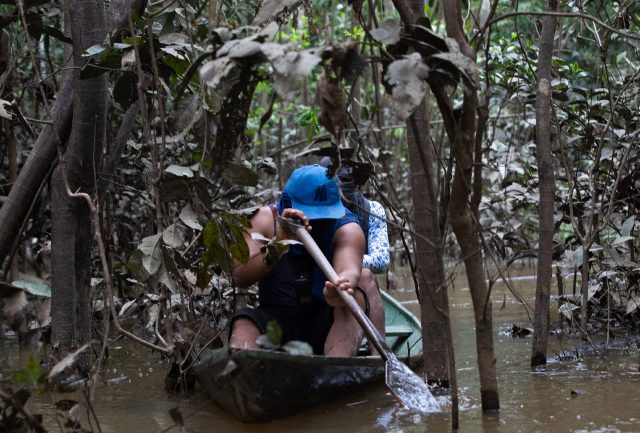 Members of the Union of Indigenous Peoples of the Javari Valley (UNIVAJA), look for clues