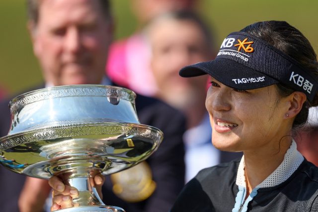 South Korea's Chun In-gee smiles with the trophy after winning the Women's PGA Championshi