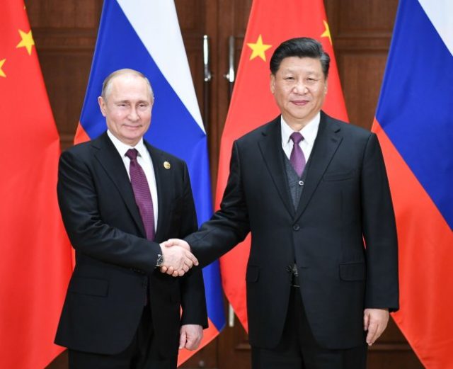 China's Xi reaffirms support for Russian "sovereignty and security" in call with Putin