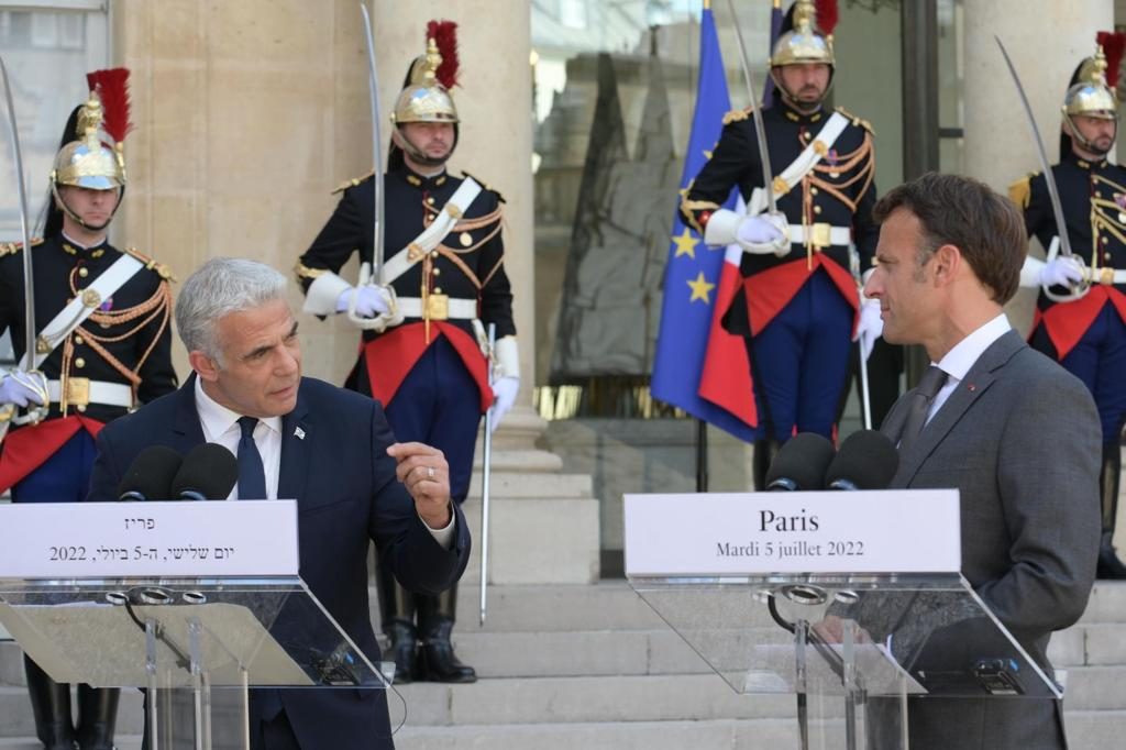 Israeli Prime Minister Yair Lapid told French President Emmanuel Macron the world must act against Iran