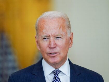 In this Aug. 20, 2021, file photo President Joe Biden speaks about the evacuation of American citizens, their families, SIV applicants and vulnerable Afghans in the East Room of the White House in Washington. President Joe Biden's job approval rating has ticked down and Americans are taking a notably less …