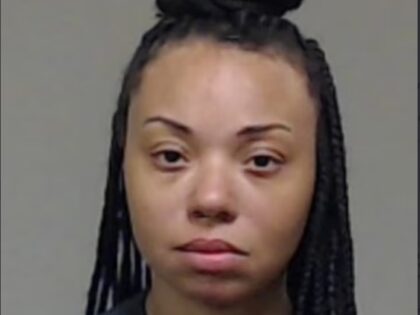 The alleged female shooter who opened fired in Dallas Love Field airport Monday claimed to be "God's prophet" and R&B singer-songwriter Chris Brown's wife.