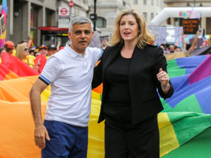 LONDON, UK, UNITED KINGDOM - 2019/07/06: Mayor of London, Sadiq Khan (L) and Penny Mordaunt Minister for Women and Equalities (R) are seen during the parade. The biggest ever, Pride In London parade in central London. An estimated over 1 million people lined along the route in support of the …