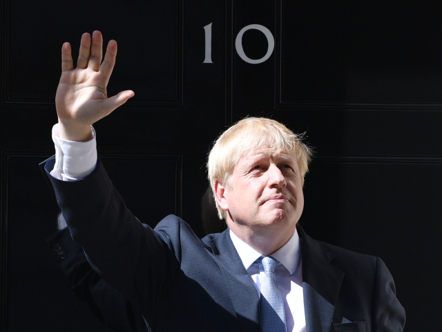 LONDON, ENGLAND - JULY 24: New Prime Minister Boris Johnson waves from the door of Number 10, Downing Street after speaking to the media on July 24, 2019 in London, England. Boris Johnson, MP for Uxbridge and South Ruislip, was elected leader of the Conservative and Unionist Party yesterday receiving …