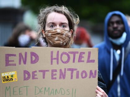 GLASGOW, SCOTLAND - JULY 01: Demonstrators join a 'Refugees Lives Matter' protest on July 1, 2020 in Glasgow, Scotland. The anti-racism demonstration called for an end to the detention of asylum seekers in hotels after six people were injured in a knife attack at Park Inn Hotel in Glasgow last …