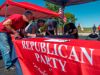 People register to vote during a Republican voter registration in Brownsville, Pennsylvania on September 5, 2020. - Less than two months before the November 3 presidential election, the contrast between Republicans and Democrats is striking in Washington County, in the suburbs of Pittsburgh. (Photo by ANDREW CABALLERO-REYNOLDS / AFP) (Photo …