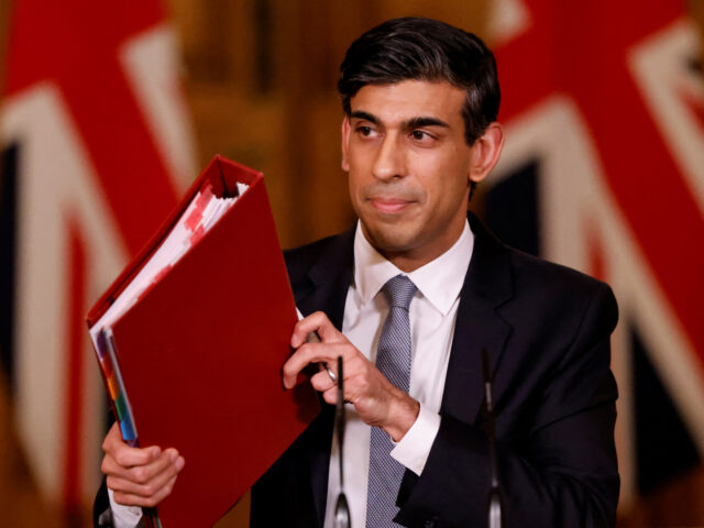Britain's Chancellor of the Exchequer Rishi Sunak attends a virtual press conference inside 10 Downing Street in central London on March 3, 2021, following his earlier Budget. - Britain on Wednesday sharply cut the growth forecast of its coronavirus-ravaged economy, warning the pandemic was still causing "profound damage" in an …