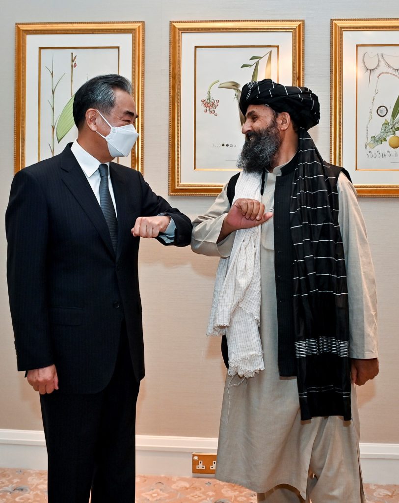 Chinese State Councilor and Foreign Minister Wang Yi meets with Mullah Abdul Ghani Baradar, political chief of Afghanistan's Taliban, in north China's Tianjin, July 28, 2021. (Photo by Li Ran/Xinhua via Getty Images)