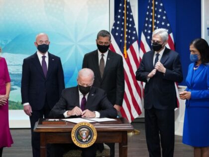 US President Joe Biden signs an executive order to help improve public safety and justice