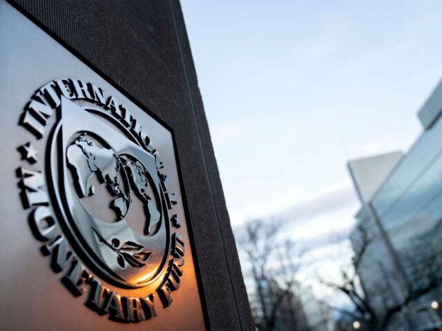 The seal for the International Monetary Fund is seen near the World Bank headquarters (R) in Washington, DC on January 10, 2022. (Photo by Stefani Reynolds / AFP) (Photo by STEFANI REYNOLDS/AFP via Getty Images)