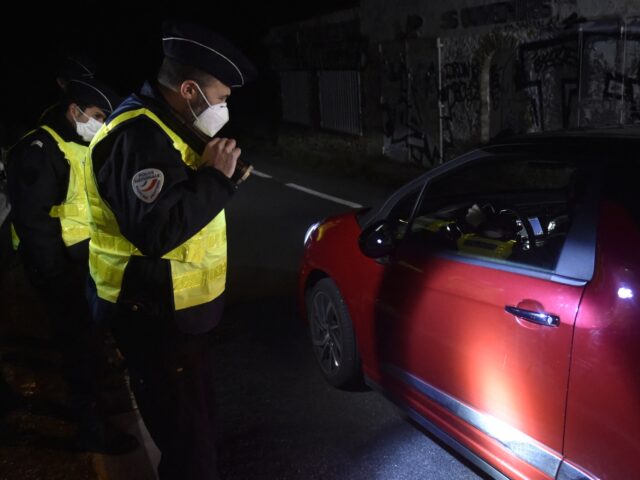 PAF (Air and Border Police) members control a vehicle coming from Spain at Cerbere border post, as part of an operation to fight illegal immigration at the Franco-Spanish border in Cerbere, southern France on January 11, 2022. (Photo by RAYMOND ROIG / AFP) (Photo by RAYMOND ROIG/AFP via Getty Images)