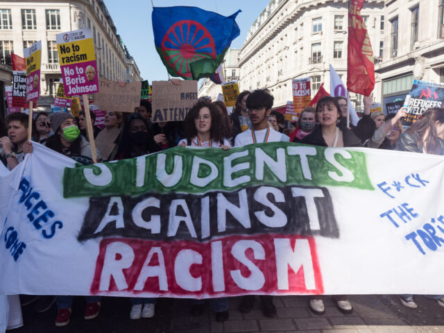 LONDON, UNITED KINGDOM - MARCH 19: Students take part in a march to oppose racism, Islamophobia, antisemitism and fascism, and to express support for refugees as part of United Nations Anti-Racism Day in London, United Kingdom on March 19, 2022. The campaigners call for action to erradicate institutional racism in …