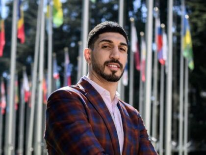 American basketball player Enes Kanter Freedom poses during an interview with AFP at the United Nations Office in Geneva on April 5, 2022. - Enes Kanter Freedom, whose human rights advocacy has ruffled feathers, hopes to bend UN human rights chief Michelle Bachelet's ear on Thursday about her forthcoming China …