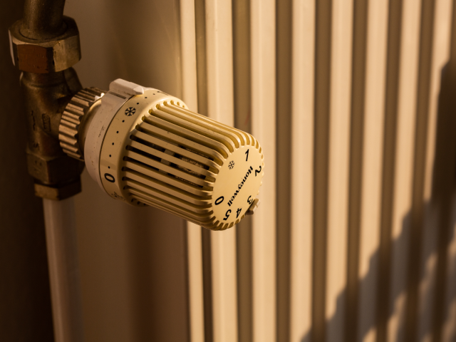 PRODUCTION - 25 March 2022, Berlin: A heater glows golden in an apartment in the light of the rising sun. Rising energy costs are already a burden for many households. Photo: Fernando Gutierrez-Juarez/dpa-Zentralbild/dpa (Photo by Fernando Gutierrez-Juarez/picture alliance via Getty Images)