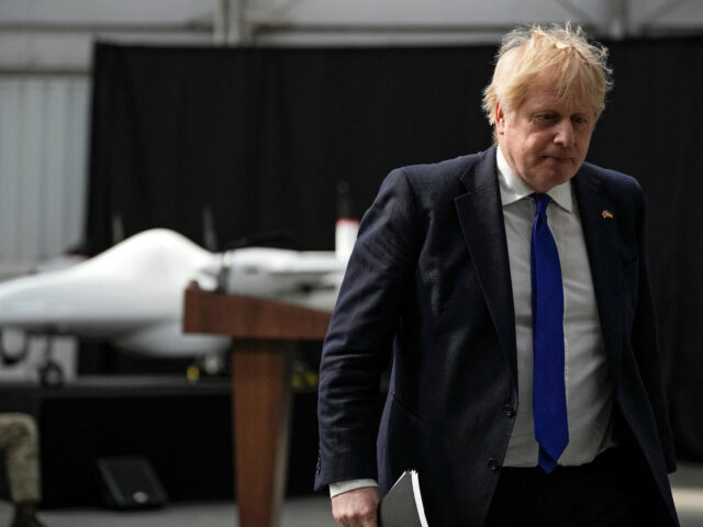 Britain's Prime Minister Boris Johnson leaves after making a speech on immigration, at Lyd